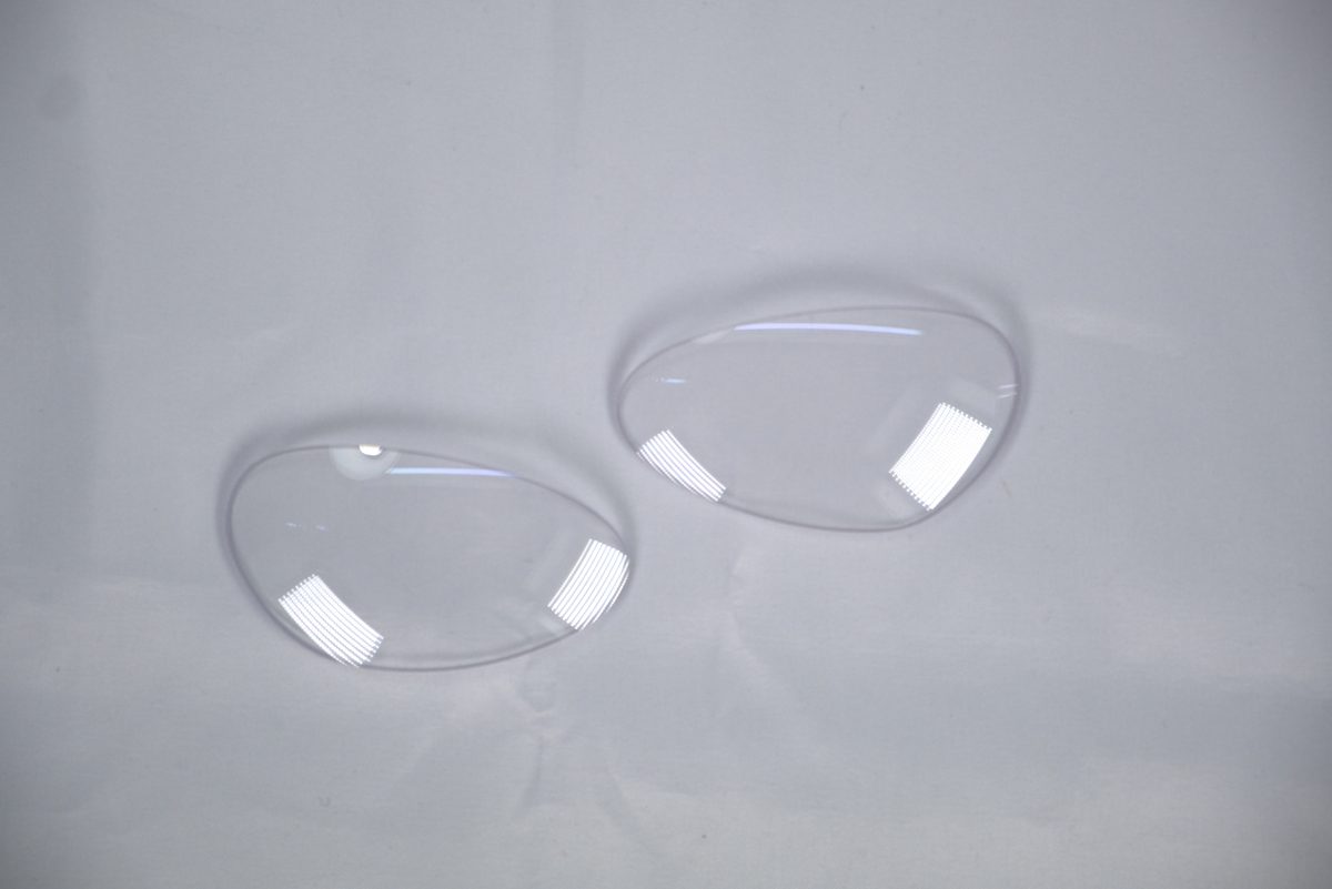 A pair of clear ANSI Z87.1 ballistic lenses