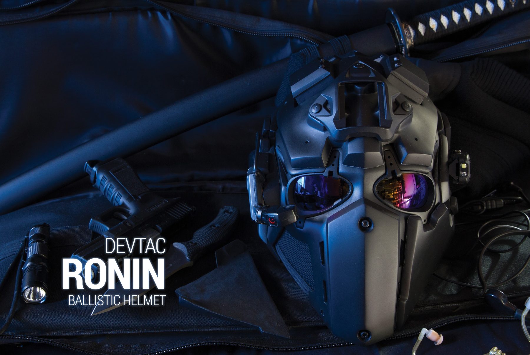 Devtac Ronin ballistic helmet photographed with a katana, sidearm and field gear